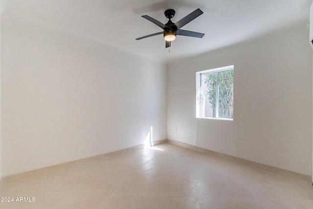 spare room with ceiling fan