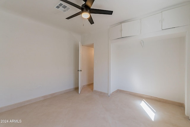 unfurnished bedroom featuring ceiling fan