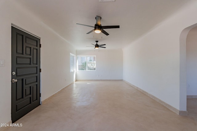 unfurnished room with ceiling fan