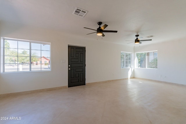 unfurnished room featuring ceiling fan