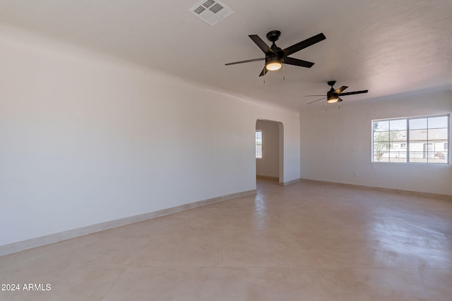 unfurnished room with ceiling fan