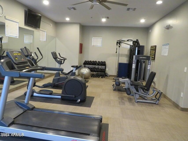 workout area with ceiling fan