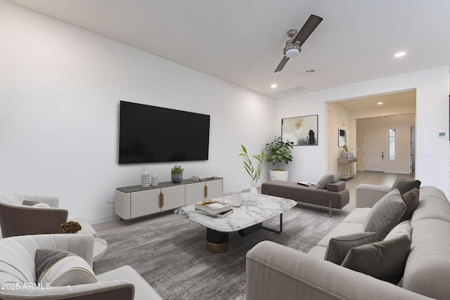 22960 N 94th Ln, Peoria, AZ 85383 - living room with recessed lighting, ceiling fan, wood finished floors, and baseboards