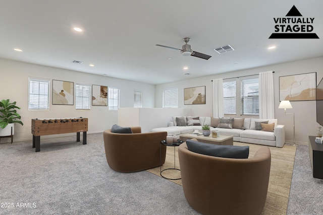 22960 N 94th Ln, Peoria, AZ 85383 - living area with carpet floors, ceiling fan, recessed lighting, and baseboards
