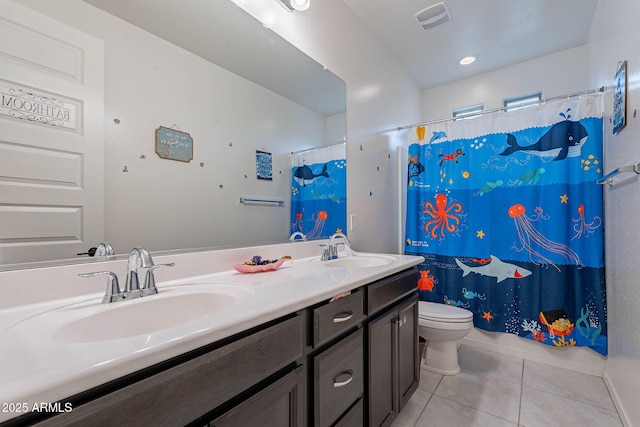 22960 N 94th Ln, Peoria, AZ 85383 - bathroom featuring tile patterned flooring, toilet, double vanity, and curtained shower