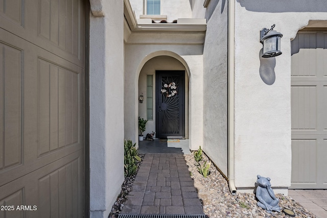 22960 N 94th Ln, Peoria, AZ 85383 - doorway to property featuring stucco siding