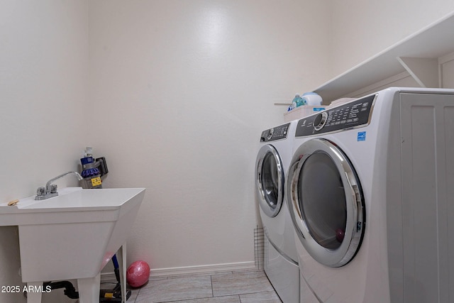 22960 N 94th Ln, Peoria, AZ 85383 - laundry room with washer and dryer and baseboards
