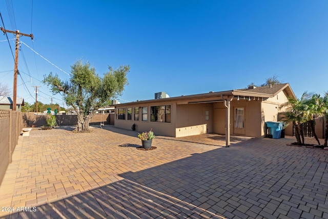 back of house featuring a patio