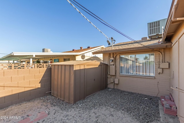 exterior space featuring a storage shed