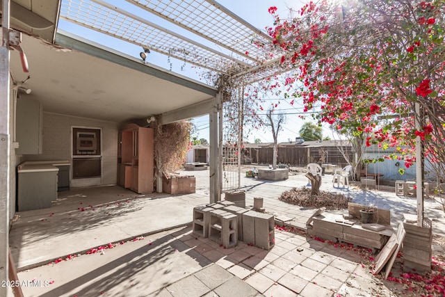 view of patio featuring a pergola