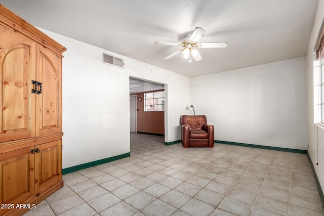 spare room featuring ceiling fan