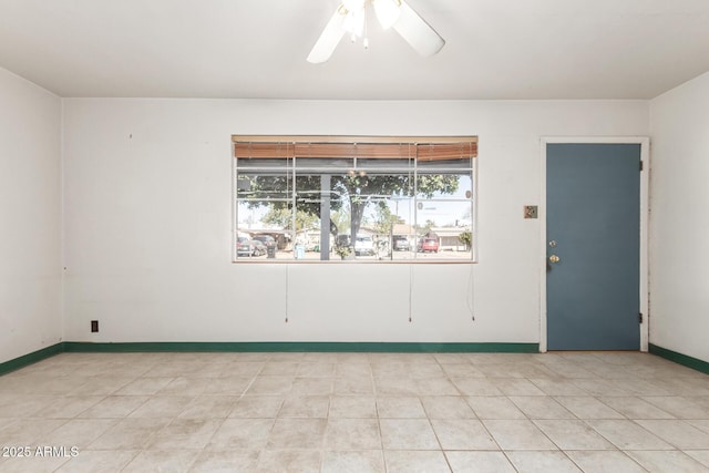 empty room featuring ceiling fan