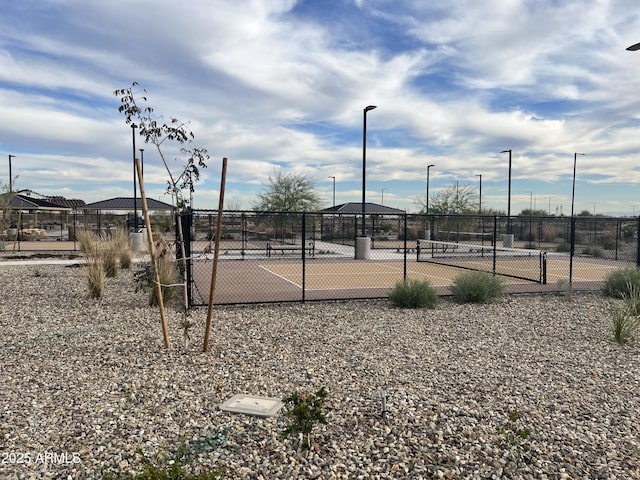 exterior space with a gazebo and fence