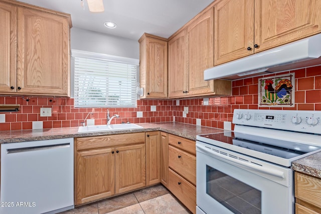 kitchen with tasteful backsplash, dishwasher, sink, and white range with electric cooktop