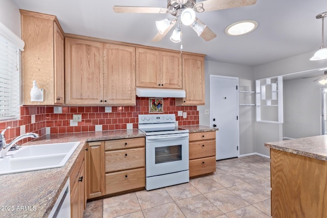 kitchen featuring sink, tasteful backsplash, hanging light fixtures, light brown cabinets, and white appliances