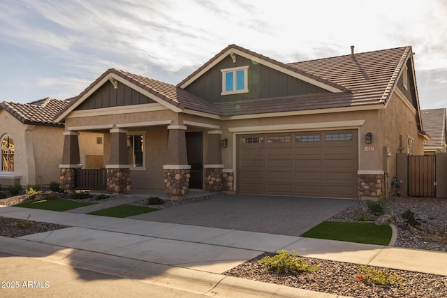 craftsman inspired home featuring a porch and a garage