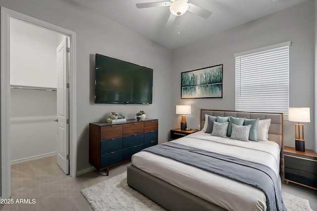 bedroom with light carpet and ceiling fan