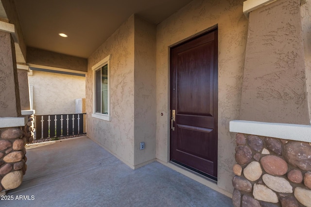 property entrance with a porch