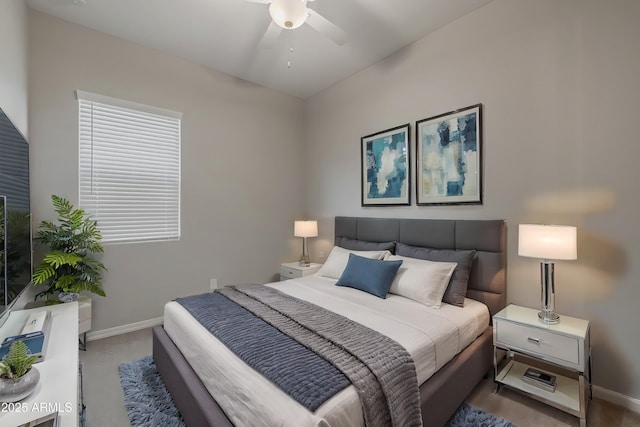 bedroom featuring ceiling fan and carpet floors