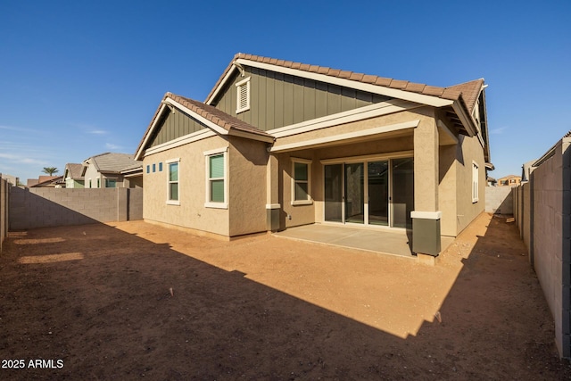 rear view of property with a patio