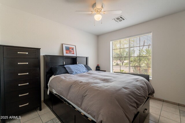 10305 E Dragoon Ave, Mesa, AZ 85208 - bedroom featuring light tile patterned floors and a ceiling fan