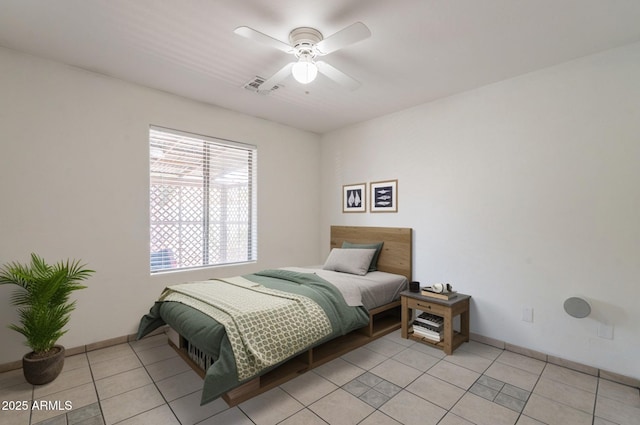 10305 E Dragoon Ave, Mesa, AZ 85208 - bedroom with light tile patterned floors and ceiling fan