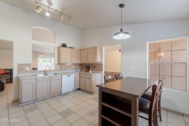 10305 E Dragoon Ave, Mesa, AZ 85208 - kitchen with white dishwasher, backsplash, light brown cabinetry, light tile patterned flooring, and light countertops
