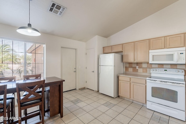 10305 E Dragoon Ave, Mesa, AZ 85208 - kitchen with white appliances, light brown cabinetry, vaulted ceiling, decorative backsplash, and light countertops