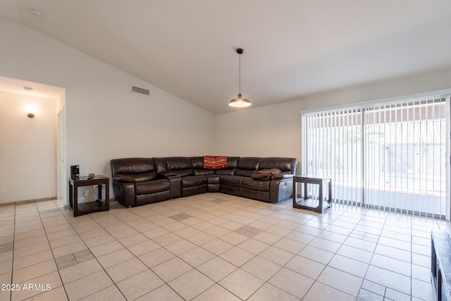 10305 E Dragoon Ave, Mesa, AZ 85208 - living area featuring lofted ceiling and light tile patterned floors