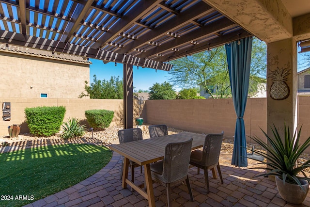 view of patio featuring a pergola