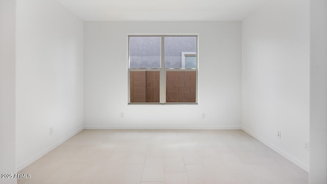 25118 N 171st Ln, Surprise, AZ 85387 - spare room with baseboards and light flooring
