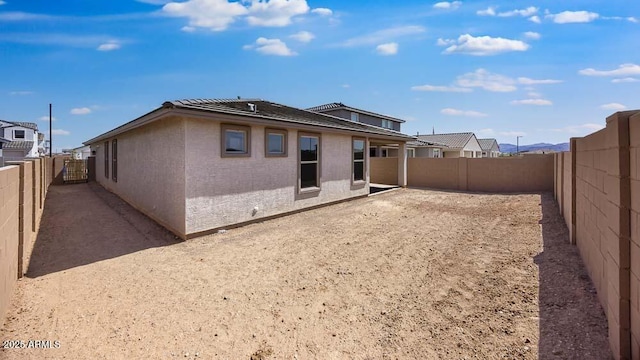 25118 N 171st Ln, Surprise, AZ 85387 - rear view of property featuring a fenced backyard and a tile roof
