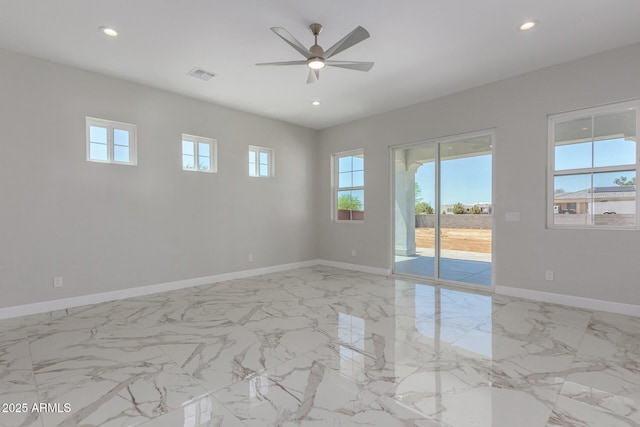 empty room featuring ceiling fan, baseboards, and recessed lighting