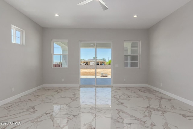 spare room with recessed lighting, ceiling fan, baseboards, and a healthy amount of sunlight