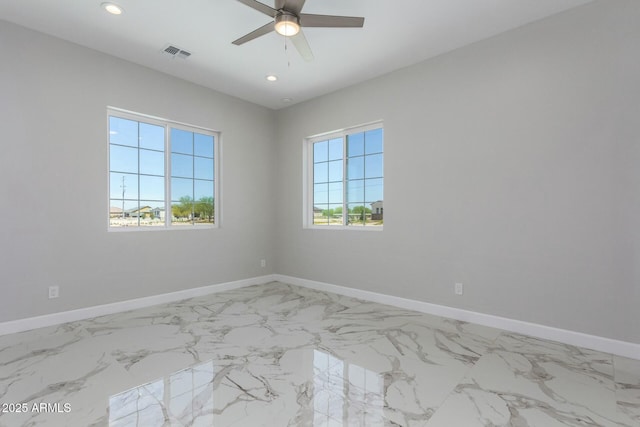 unfurnished room featuring visible vents, baseboards, and recessed lighting