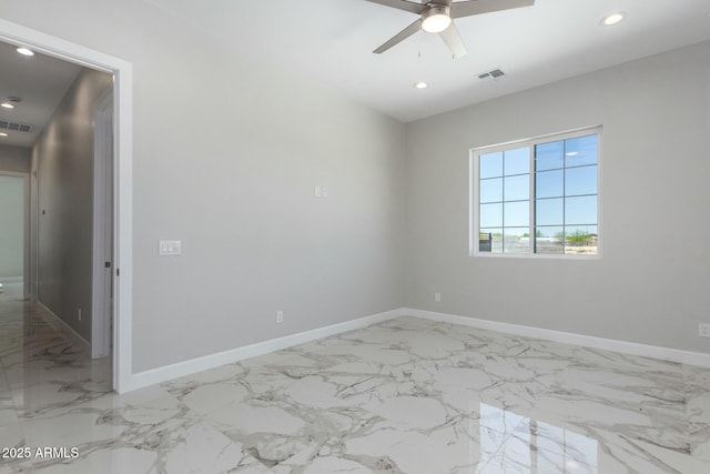 empty room featuring baseboards, a ceiling fan, marble finish floor, and recessed lighting
