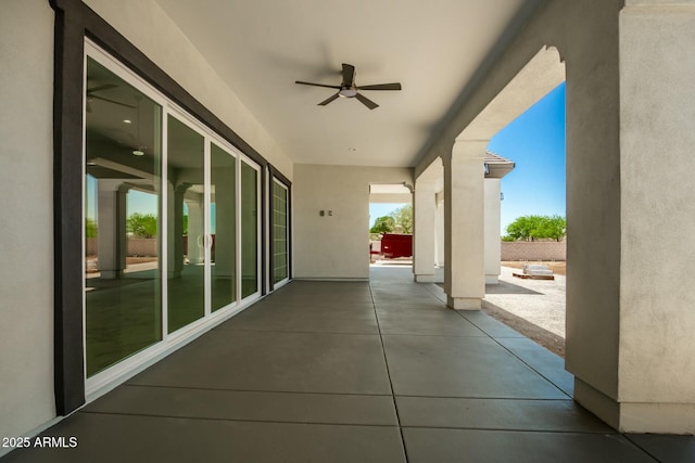 view of patio featuring a ceiling fan