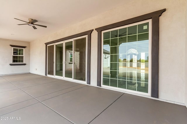 view of patio / terrace with a ceiling fan