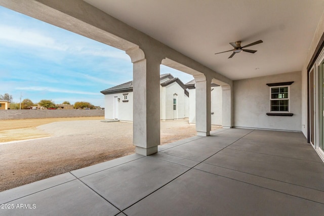 view of patio featuring a ceiling fan