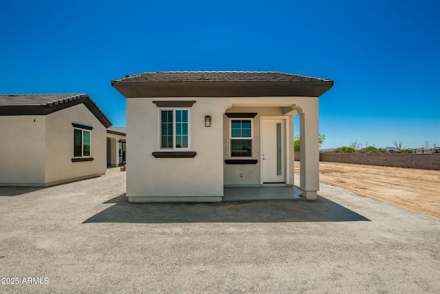 exterior space with stucco siding