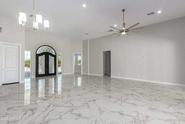 foyer entrance featuring recessed lighting, baseboards, and a wealth of natural light