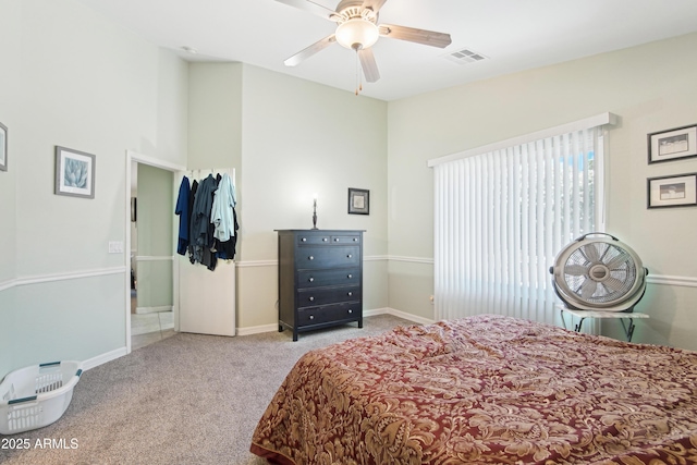 2401 E Antigua Dr, Casa Grande, AZ 85194 - carpeted bedroom with baseboards and a ceiling fan