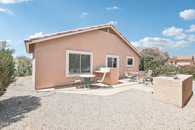 2401 E Antigua Dr, Casa Grande, AZ 85194 - rear view of property with a patio and stucco siding