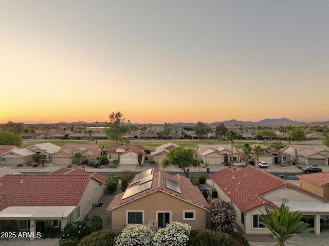 2401 E Antigua Dr, Casa Grande, AZ 85194 - aerial view at dusk of a residential view and a mountain view