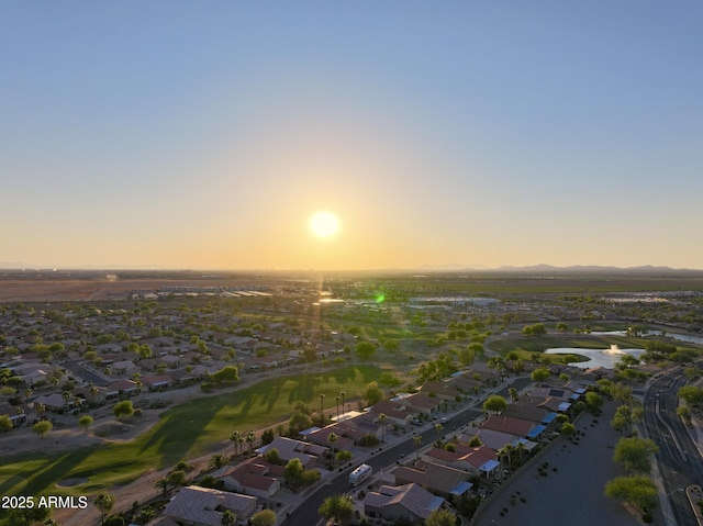 2401 E Antigua Dr, Casa Grande, AZ 85194 - aerial view at dusk of a residential view, a water and mountain view, and view of golf course