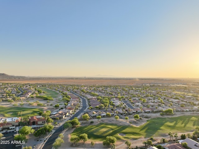 2401 E Antigua Dr, Casa Grande, AZ 85194 - aerial view at dusk of a residential view, a mountain view, and view of golf course