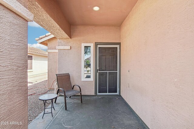 2401 E Antigua Dr, Casa Grande, AZ 85194 - entrance to property featuring stucco siding and a patio area