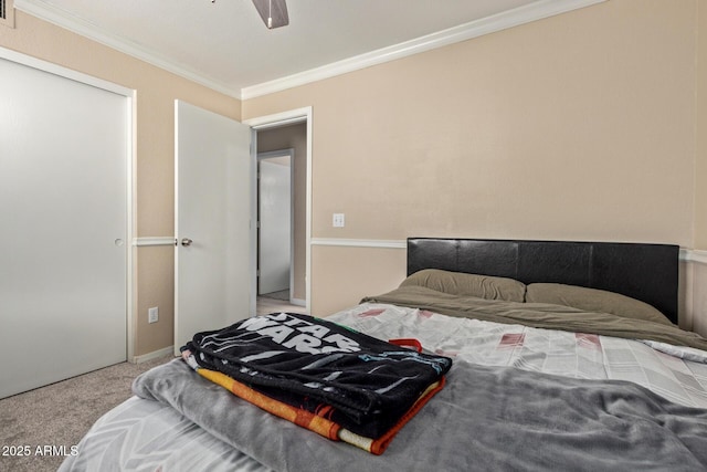 5018 W Wikieup Ln, Glendale, AZ 85308 - carpeted bedroom featuring crown molding, a ceiling fan, and a closet