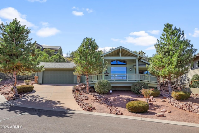 view of front facade with driveway and an attached garage