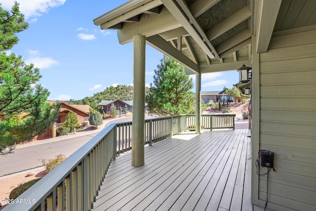 wooden deck with a residential view